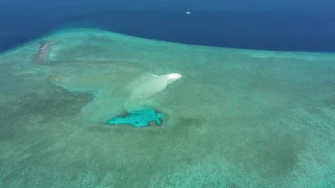 Reef and sand visible beneath shallow waters Stock-Footage 327452661