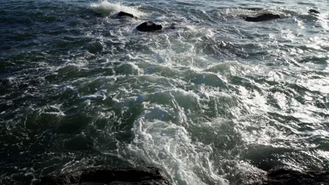 Reef and waves at sunset. Stock Footage 155948570