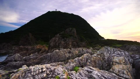 Reef of Turbidite Layers and the Distant View of Cape Muroto Lighthouse at Vidéo 330969411