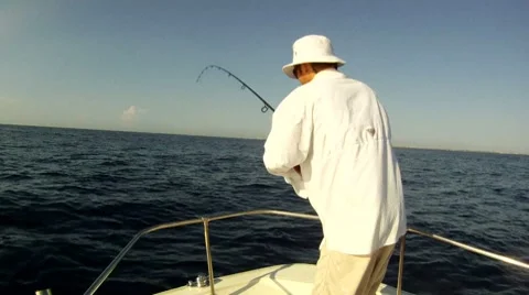 Reeling in Fish Stock-Footage 7902751