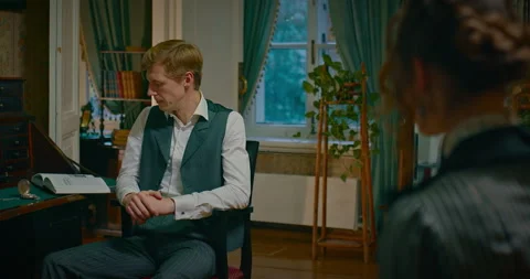 Reenactment of scene of 19th century, man and woman in vintage interior Stock Footage 264504981