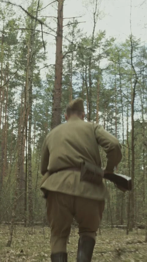 Reenactor Dressed As Russian Soviet Infantry Soldier Of World War Ii Run With Stock Footage 331957550