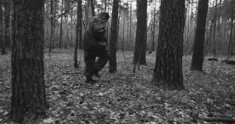 Reenactor Dressed As Russian Soviet Sniper In Camouflage Suit Sneak Carefully Stock Footage 274949478