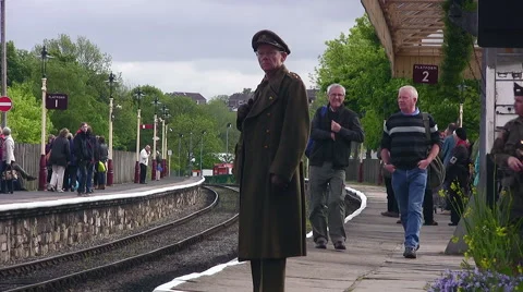 Reenactors in WWII uniform at Ramsbottom station on East Lancs Railway event Stock Footage 59170135
