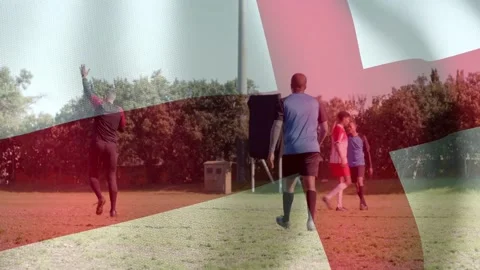 Ref raising arm, signaling pause on sport pitch while players repositioning, Stock Footage 334788282