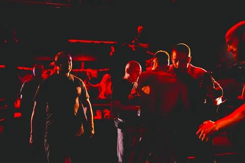 Referee is checking fighter before enters in ring, cage at MMA match Stock Photos