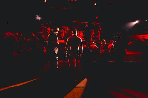 Referee is checking fighter before enters in ring, cage at MMA match Stock Photos