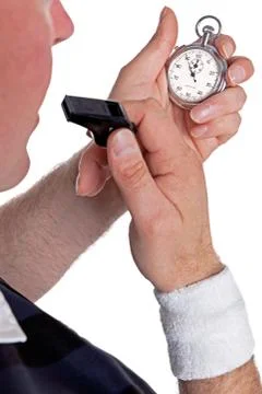 Referee checking stopwatch Stock Photos