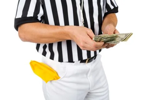 Referee: counting money from a bribe Stock Photos