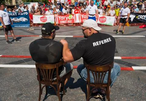 Referee discuss performance athlete Stock Photos