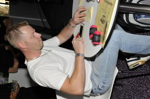 Referee doing his administration Stock Photos