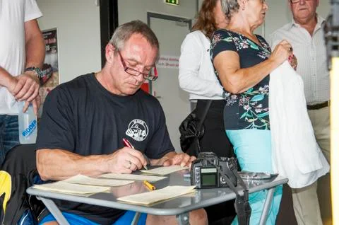 Referee doing his administrational work Stock Photos