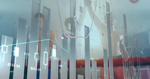 Referee lifting winner's glove in ring, signaling victory while finance charts Stock Footage 314408615