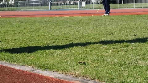 The referee measure the distance of shot put ball . Stock Footage 105958498