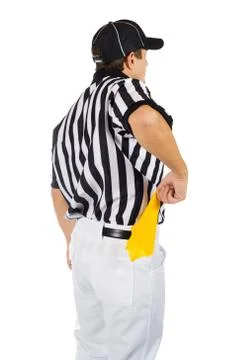 Referee: pulling penalty flag from pocket Stock Photos
