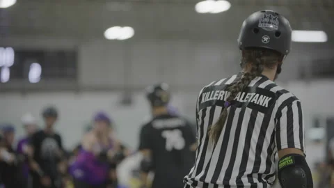 Referee at a roller derby game Video stock 232534107