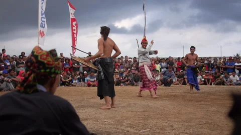 Referee starts and ends fight at Peresean Stick Fighting Festival at Video stock 131020490