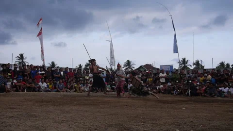Referee stops fight and dances at Peresean Stick Fighting Festival at Video stock 131020523