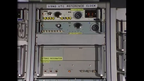 A reference clock and an atomic resonator are shown at United States Naval Stock Footage 115451994