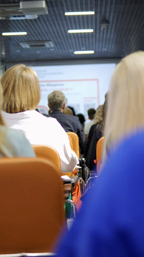 This refers to those present and engaged during a conference presentation event Stock Footage 288725932