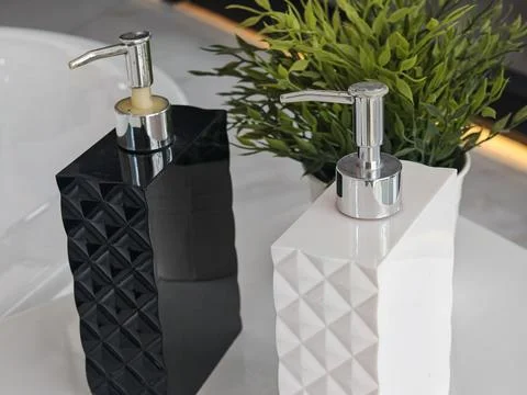 Refillable Soap Dispensers on White Table Photos