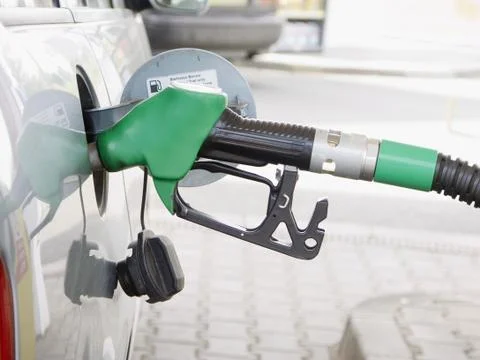 Refilling the car with a gas pump Stock Photos