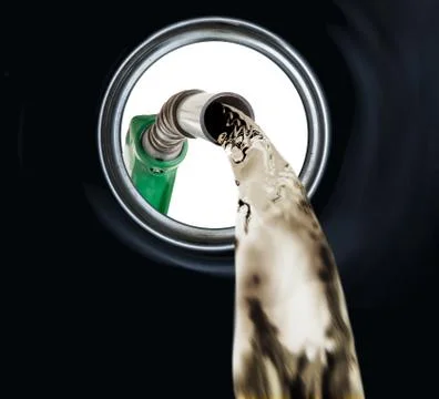 Refilling fuel view from inside of gas tank of a car Stock Photos