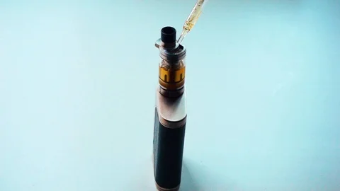 Refilling liquid in electronic cigarette Stock Footage 86788988