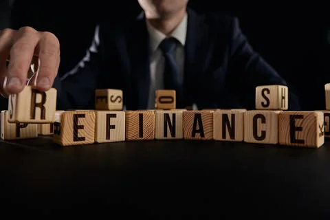 Refinance. Cubes form the word Refinance. Business concept of the word Refinance Stock Photos