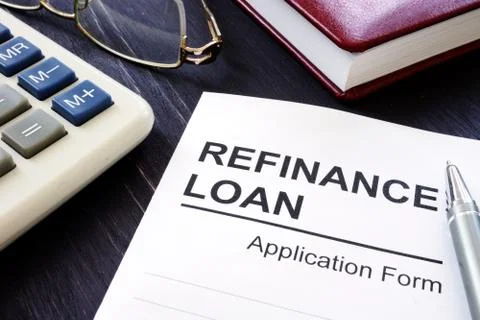 Refinance loan application form and pen. Stock Photos