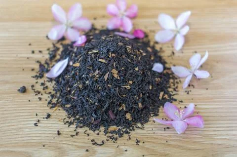 Refined black tea on a table. Stock Photos