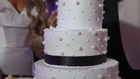 Refined Multilayered Confection Adorned With Elegant Ribbons And Delicate Sugar Stock Footage 323774179