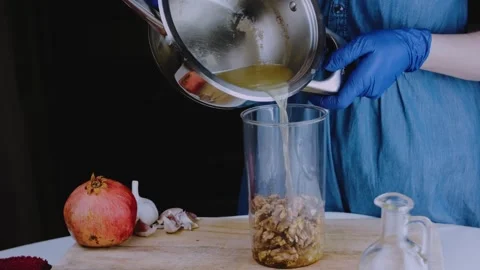 Refined professional food view: grinding walnuts for satsivi sauce Stock Footage 342201476