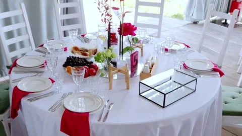 Refined wedding reception table with white linen, fruit adorned floral Stock Footage 343722299