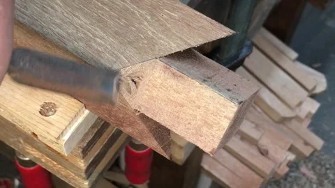 Refined woodworking with a chisel and mallet Stock Footage 317598860