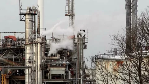 Refinery factory inside. cables, pipelines and valves for chemical mixing. Stock Footage 256675468
