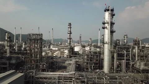 Refinery factory inside. cables, pipelines and valves for chemical mixing. Stock Footage 256678341