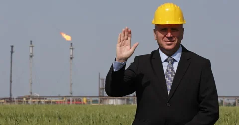 Refinery Manager Smiling Salute Potential Business Partners Press Presentation Video stock 61451762