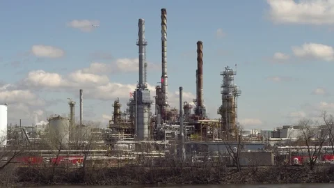 Refinery with plane Stock Footage 74400201