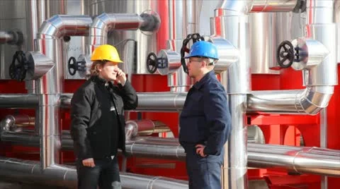 Refinery workers smiling outdoors Stock Footage 24651727