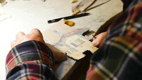 Refining of a florentine mosaic's card Stock Footage 86009933