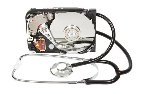 Reflected in the hard disk, a stethoscope. Diagnostic. Stock Photos