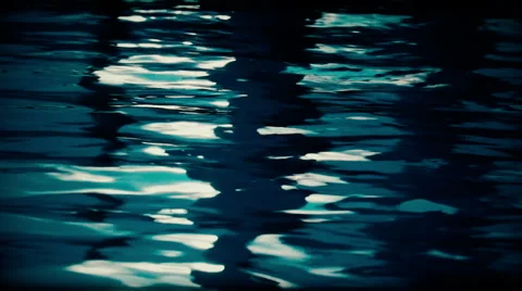 Reflected light Off the Surface of Gentle Water Ripples. Stock-Footage 50154049