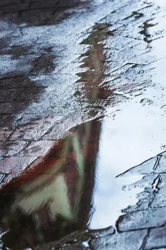 Reflected in a rain puddle Foto stock