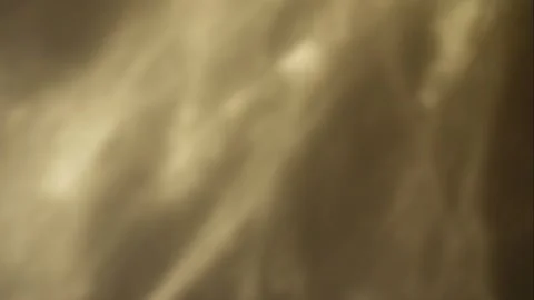 Reflected rays of the sun moving along the wall. Stock Footage 249461904