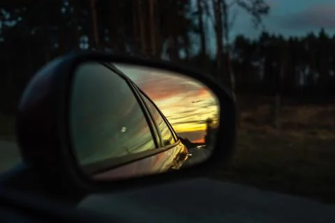 Reflected road in rearview mirror Stock Photos