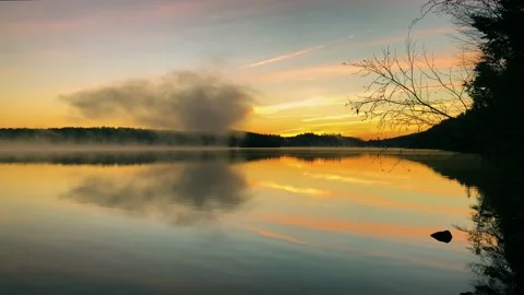 Reflected sky in lake before dawn Stock Footage 220146043
