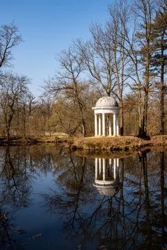 Reflected Temple in a Forest Lake Stock Photos