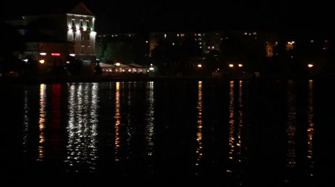 Reflected in the water of the night city Vídeos de archivo 47847339