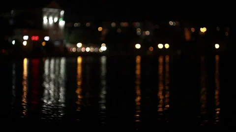 Reflected in the water of the night city Vídeos de archivo 47861979
